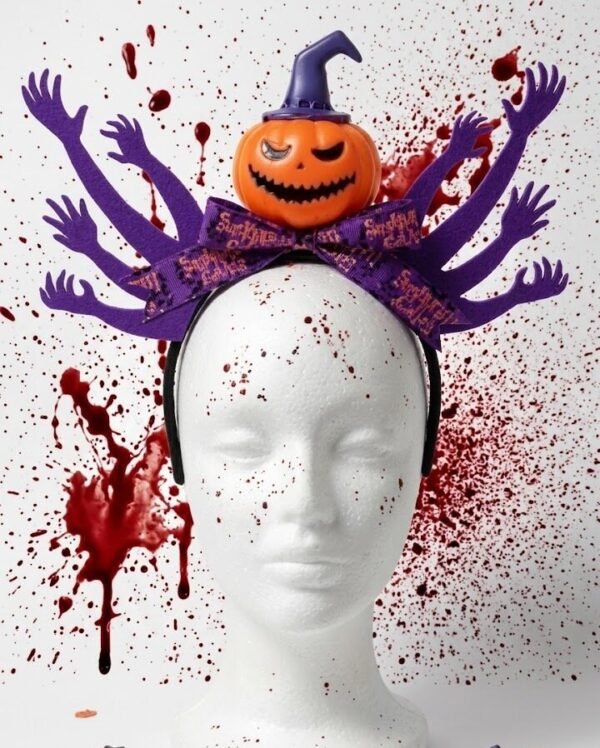 HA26 VINCHA HALLOWEEN CALABAZA CON MANOS