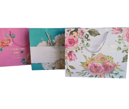 BOLSA DE REGALO CON ROSAS 32X26X11
