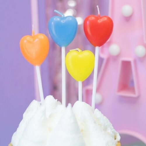 VELA CON PALITO CORAZON FLUO 10CM